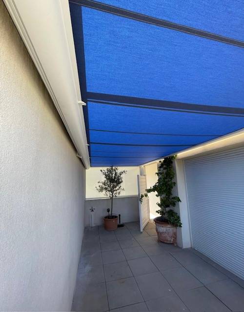 Pose professionnelle de pergolas bioclimatiques qualitatives sur mesure en aluminium Martigues 13500 Côte Bleue